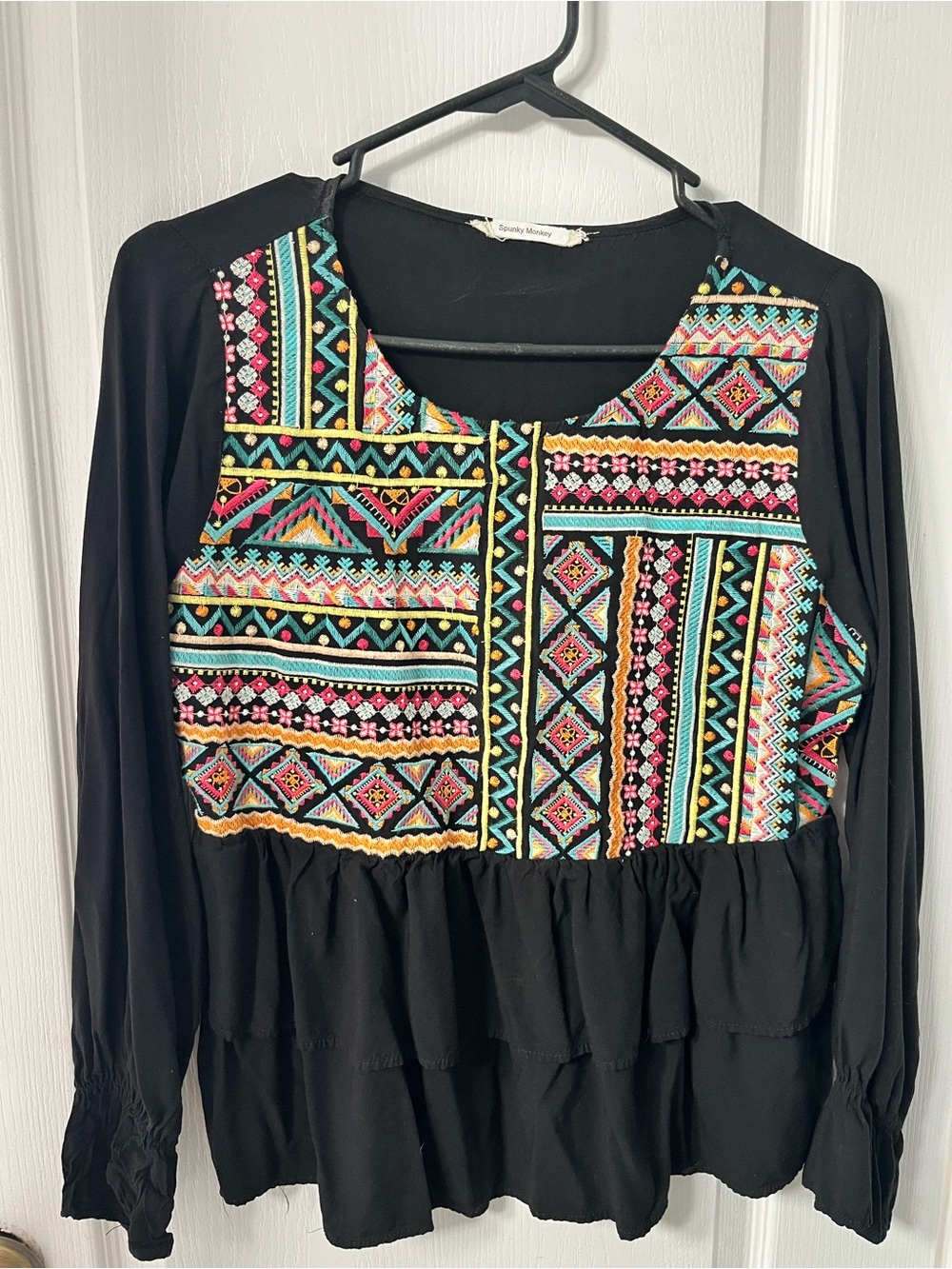 Black Embroidered Peplum Tunic Top with Multicolor Geo Motif